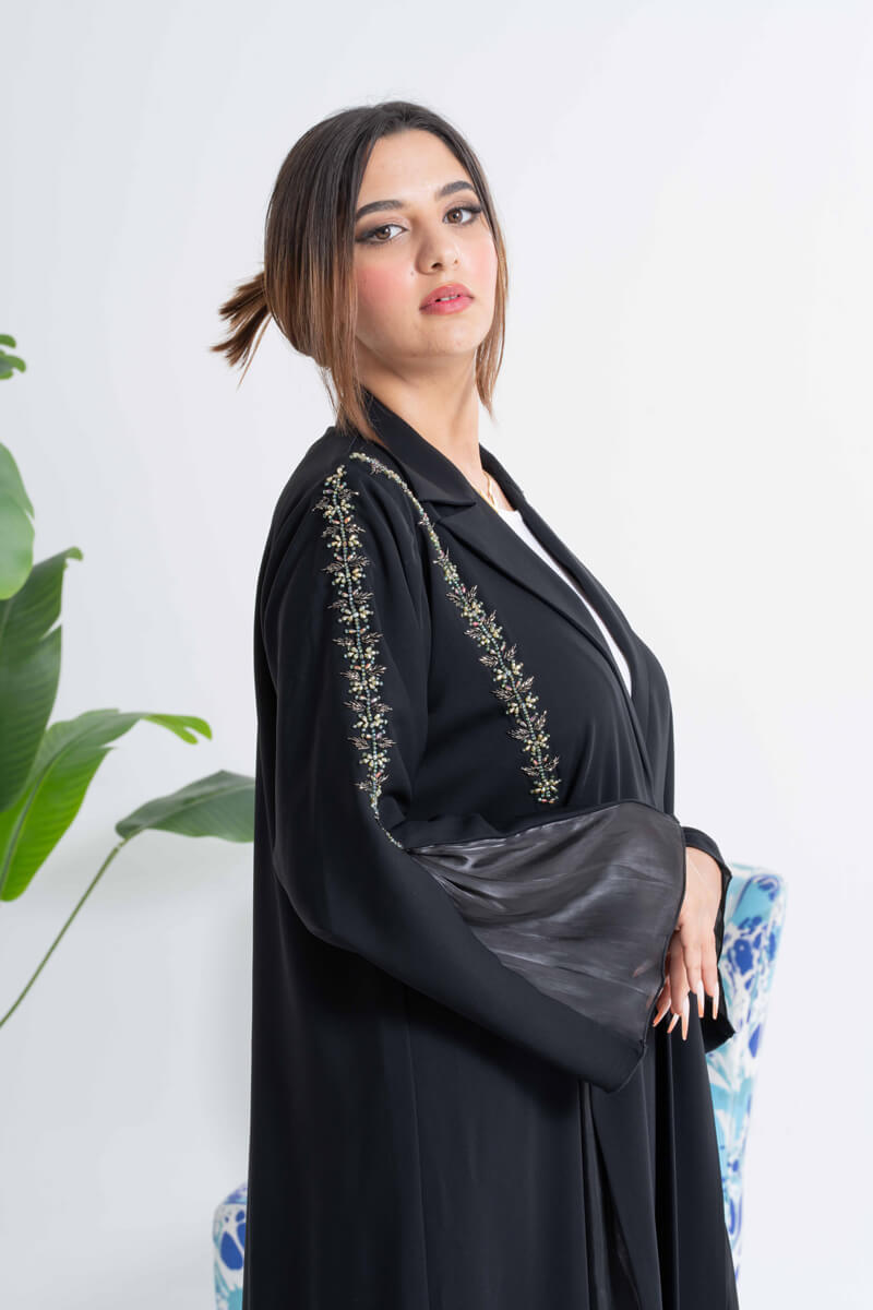 NY-36 - BLACK ABAYA WITH GREEN HANDWORK AND EXTENSION (CUBRA)
